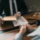 Clients come to seek advice for the law regarding privacy violations with the lawyer at the office.