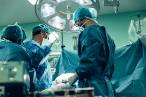 Team of Surgeons Operating in the Hospital.