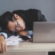 Businessman sleeping at office