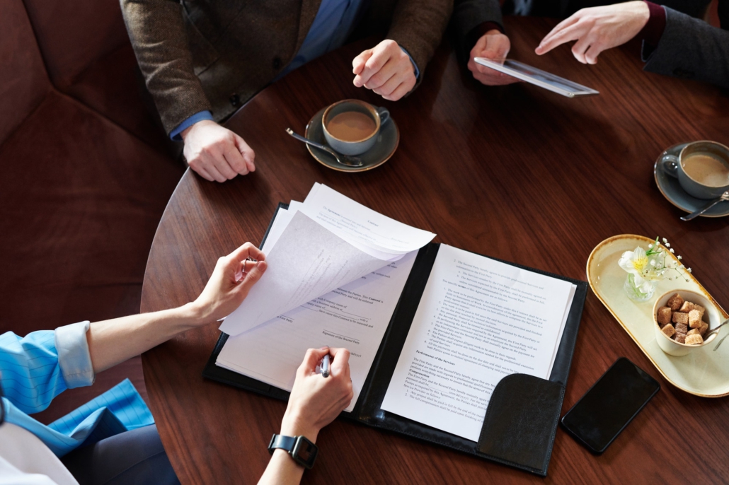 Signing contract in cafe