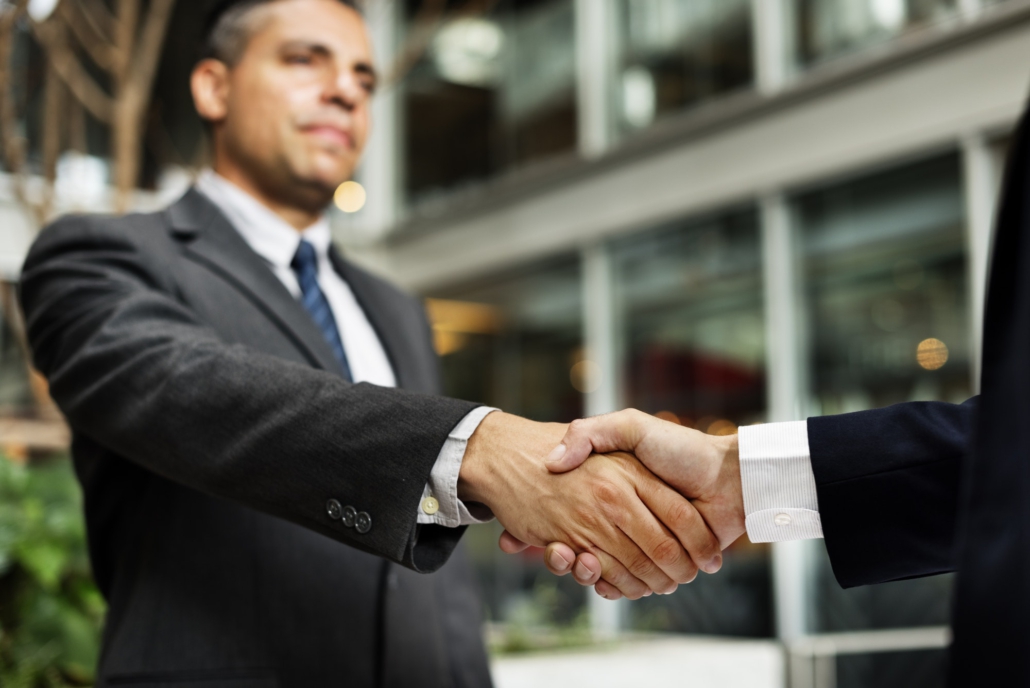 Businessmen Deal Handshake Agreement Concept