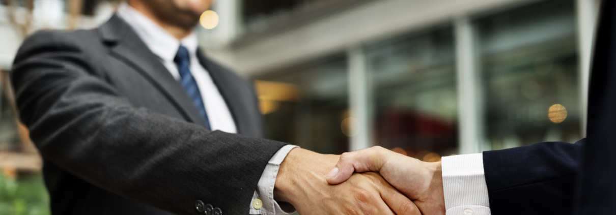 Businessmen Deal Handshake Agreement Concept